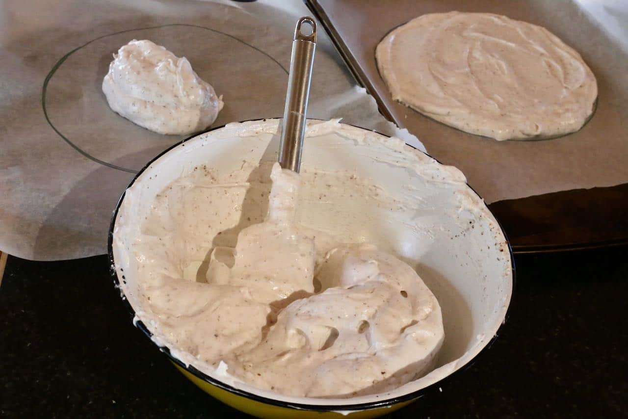 Jordgubbstårta cake layers are meringue disks. Use a pencil to draw circles on parchment paper before spooning onto baking sheets. 