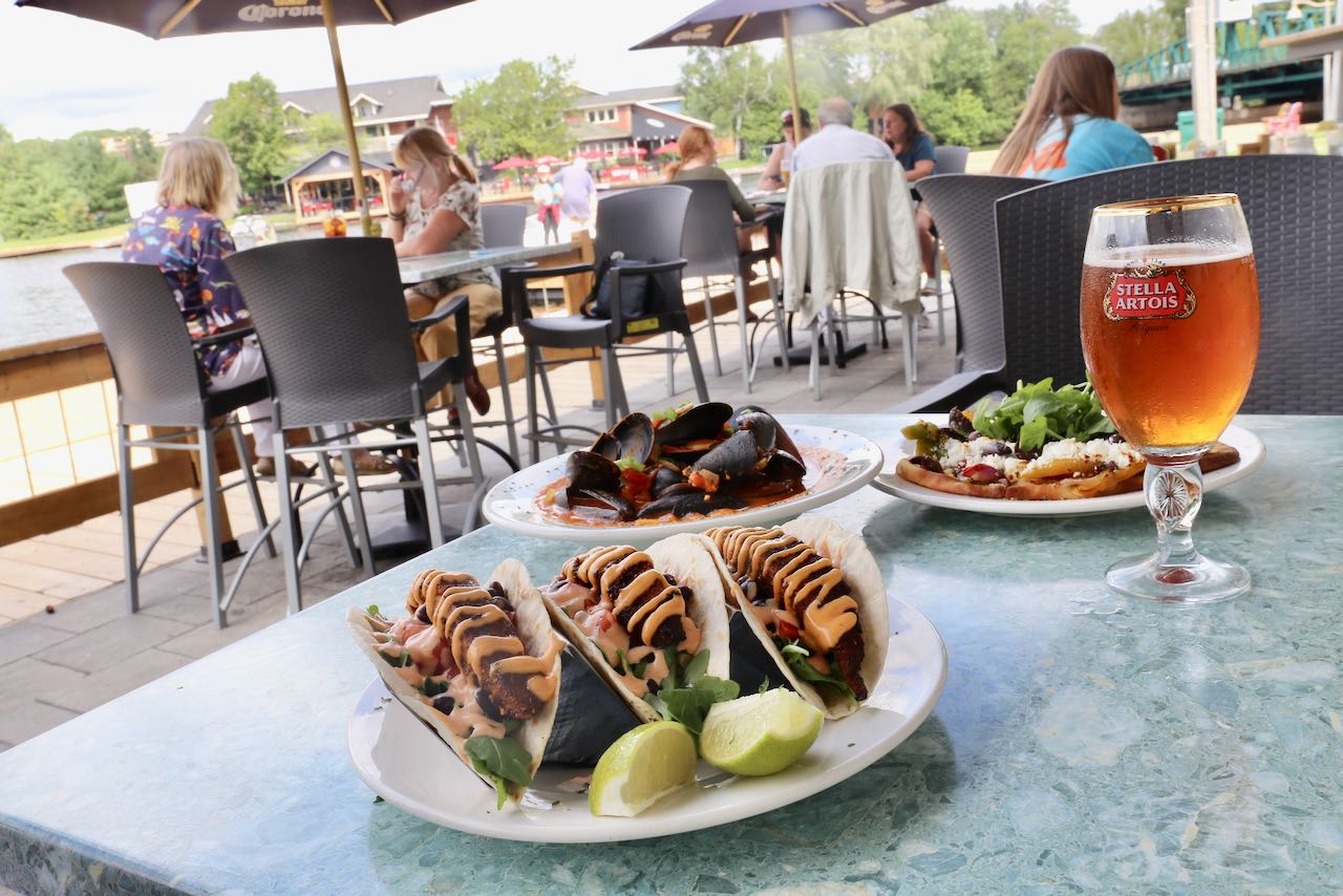 On The Docks Pub offers the best patio with a river view in Huntsville.