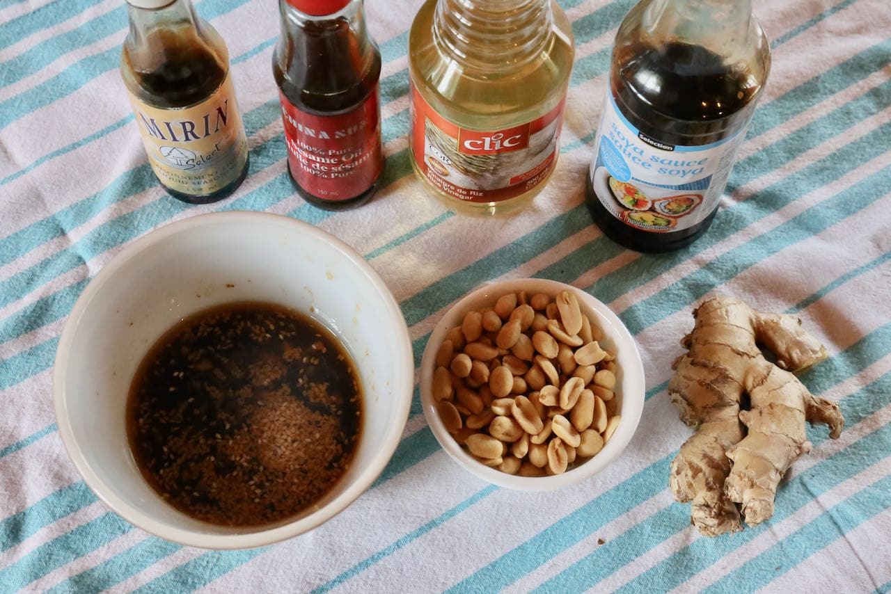 Singapore Salad vinaigrette features mirin, sesame oil, rice vinegar, ginger, and soy sauce.