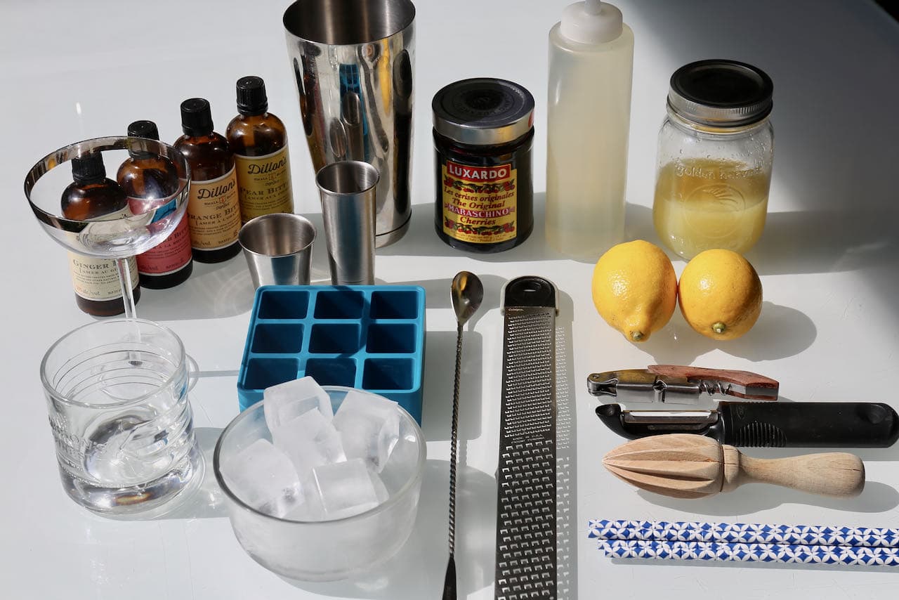 Prepare homemade gin cocktails by stocking your bar with essential mixology tools. 