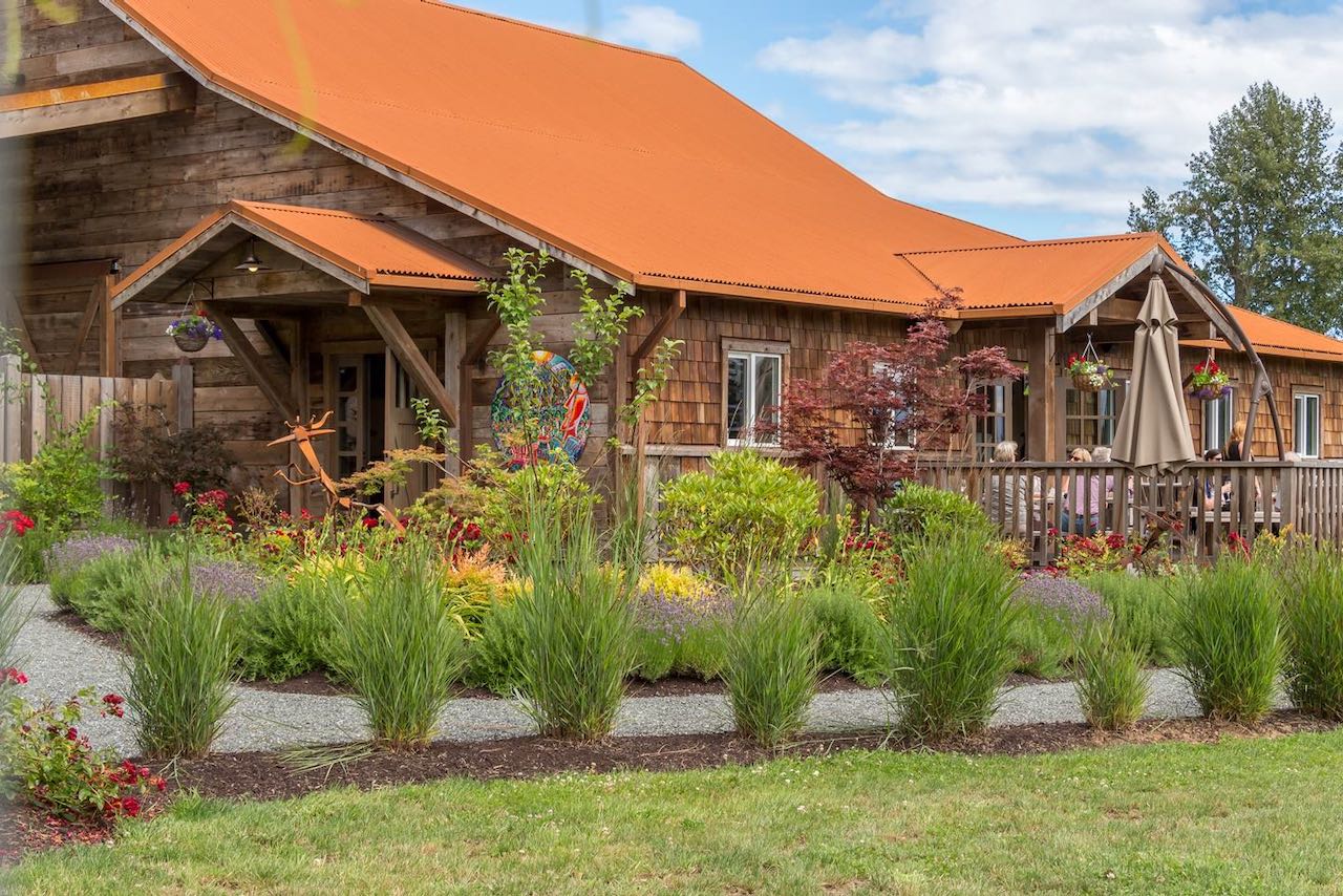 Wineries on Vancouver Island: Beautiful garden and outdoor patio at Beaufort Vineyard.