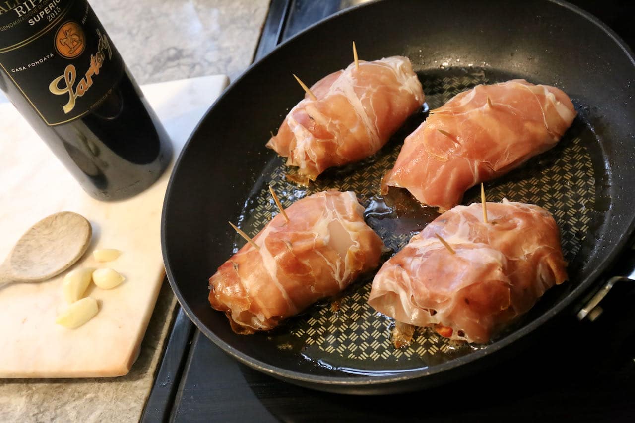Cook Involtini di Pollo bundles in a skillet until browned on both sides.