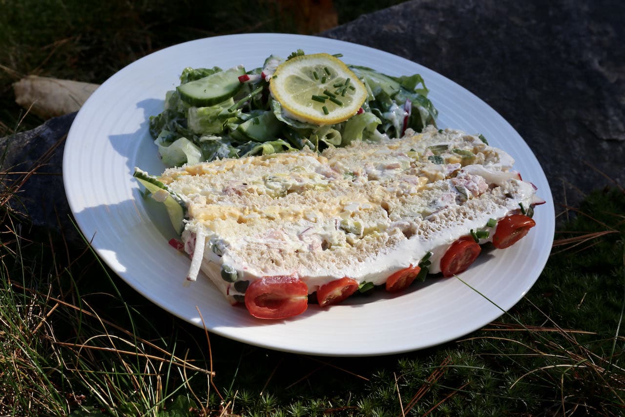 Slice Swedish Sandwich Cake and serve with a fresh salad.
