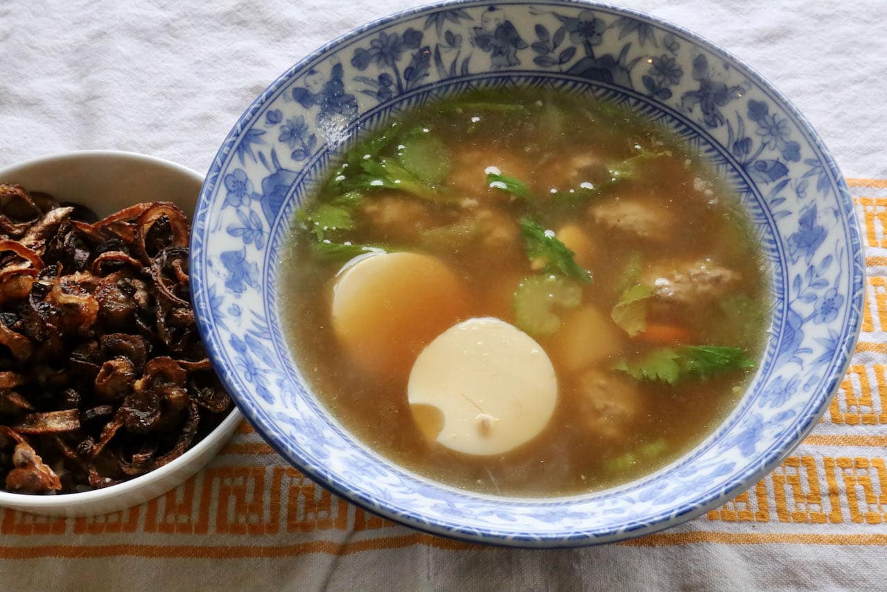 Serve Egg Tofu Soup in a large bowl topped with crispy fried shallots.