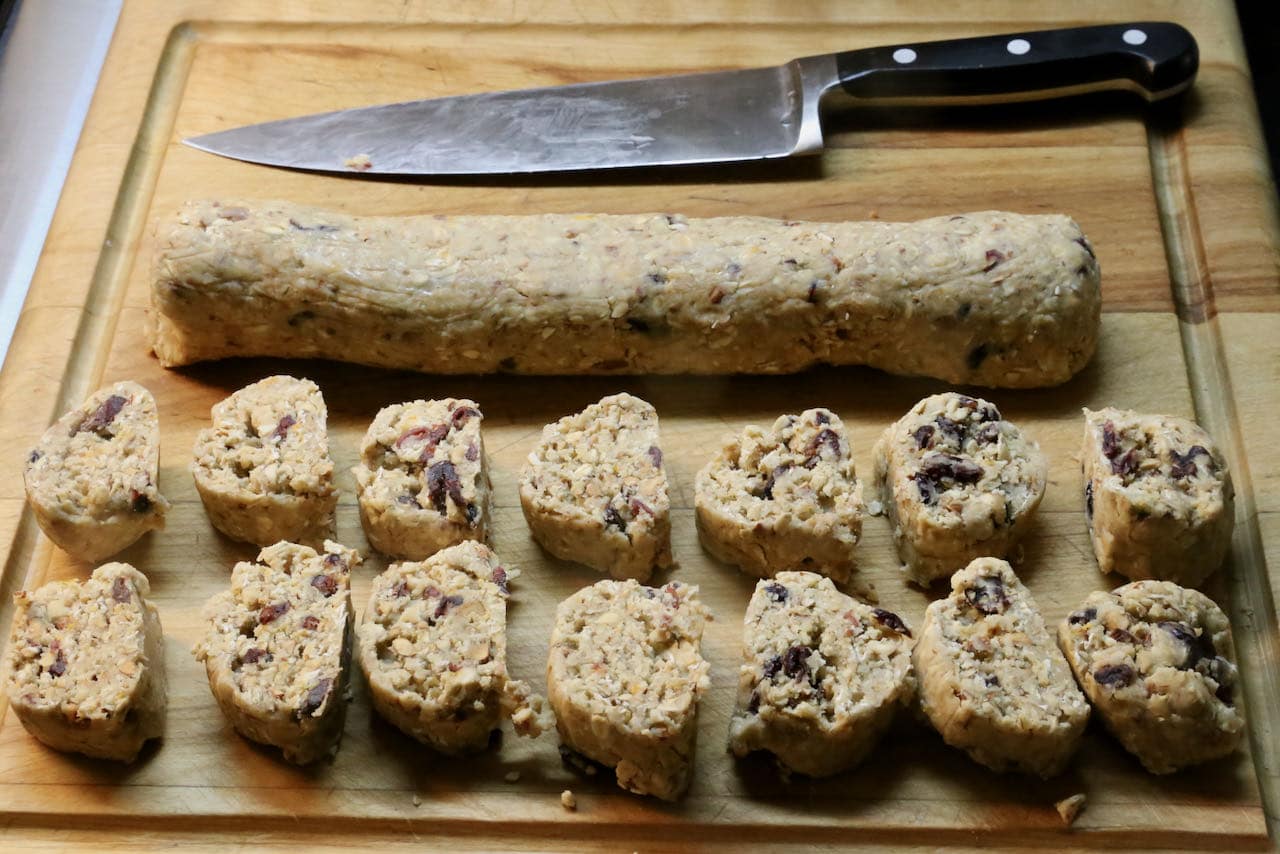 Use a sharp knife to slice Healthy Oatmeal Cranberry Cookie dough.