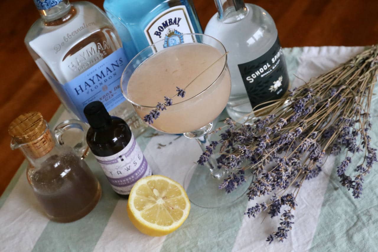 This homemade Lavender Gin Cocktail recipe is garnished with a lavender sprig.