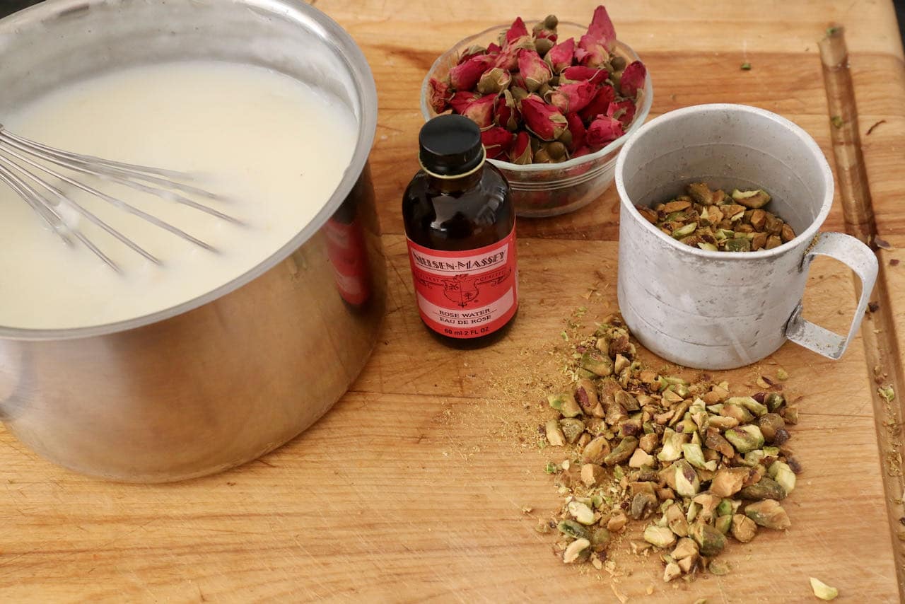 Mahalabia is a Middle Eastern milk pudding flavoured with rose water and topped with pistachio and rose petals.