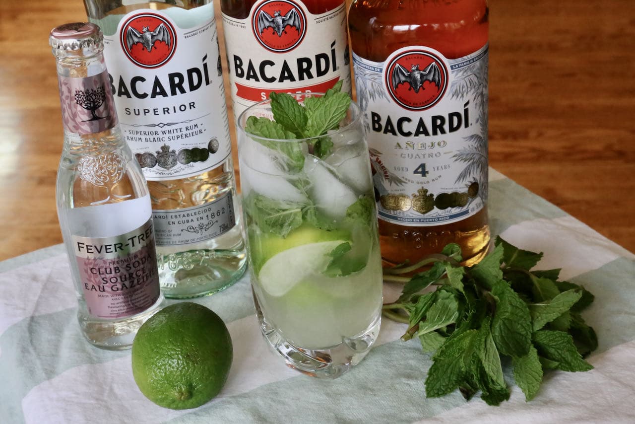 Our easy Bacardi Mojito cocktail is garnished with fresh mint and lime wedge.