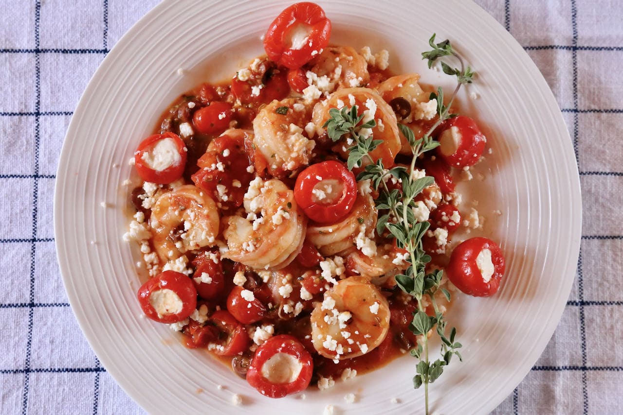 Serve a healthy Garides Saganaki feast with Greek salad.