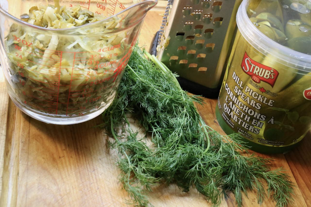 Use a cheese grater to shred dill pickles. 