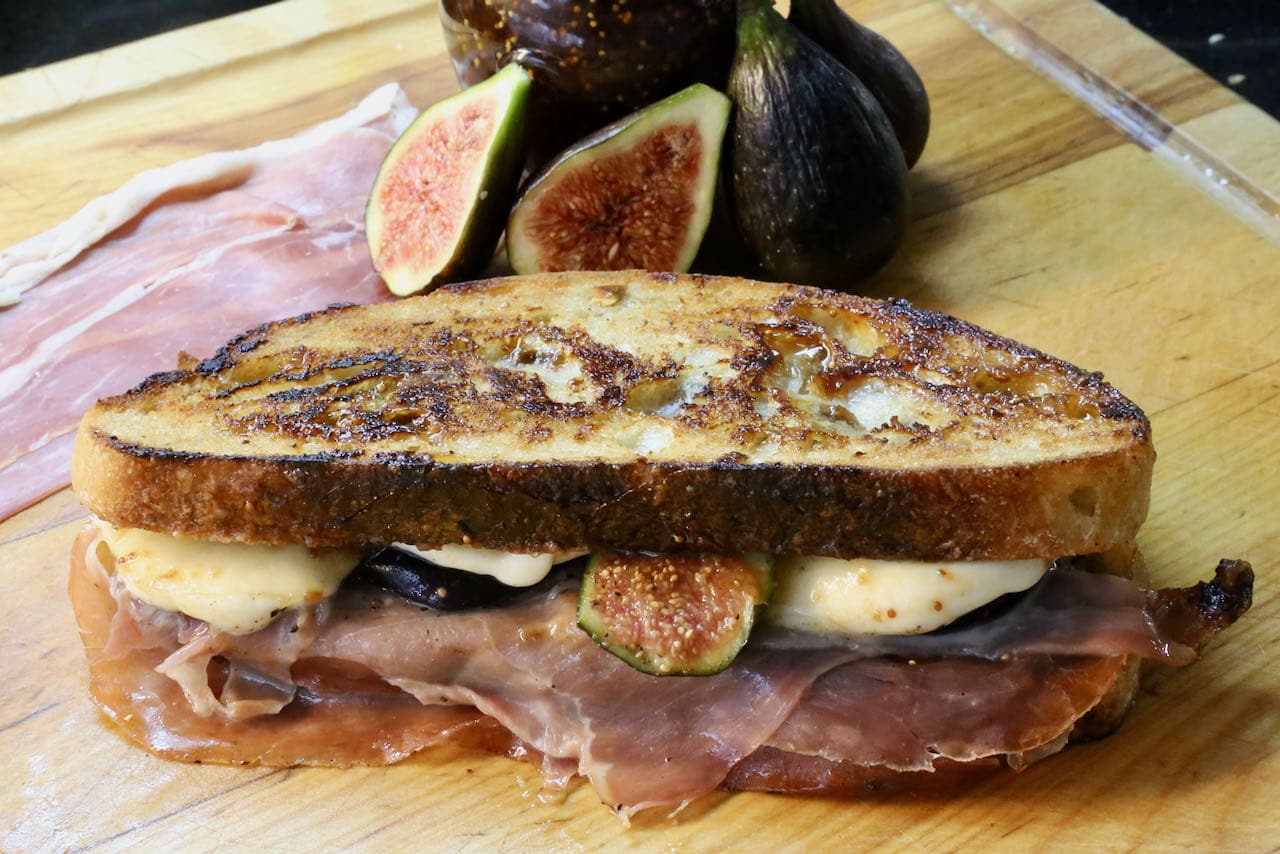 Once browned, keep each sandwich warm in the oven at 200 F until ready to serve. This will help the cheese ooze and melt to perfection!