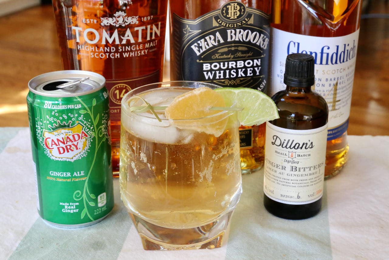 Our Whiskey and Ginger Ale drink is garnished with crystalized ginger and lime.