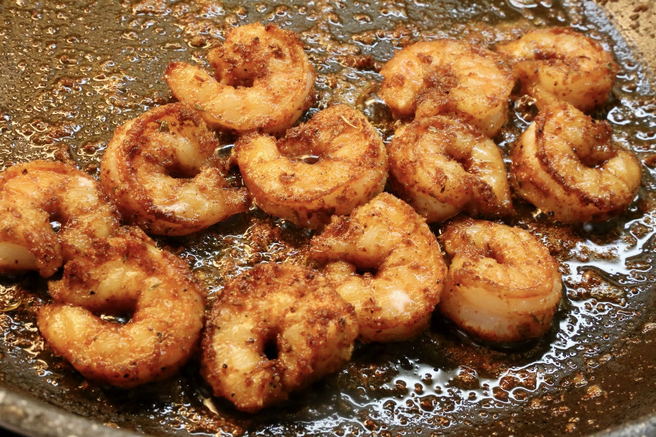 Fry Cajun shrimp in a nonstick skillet until crispy.