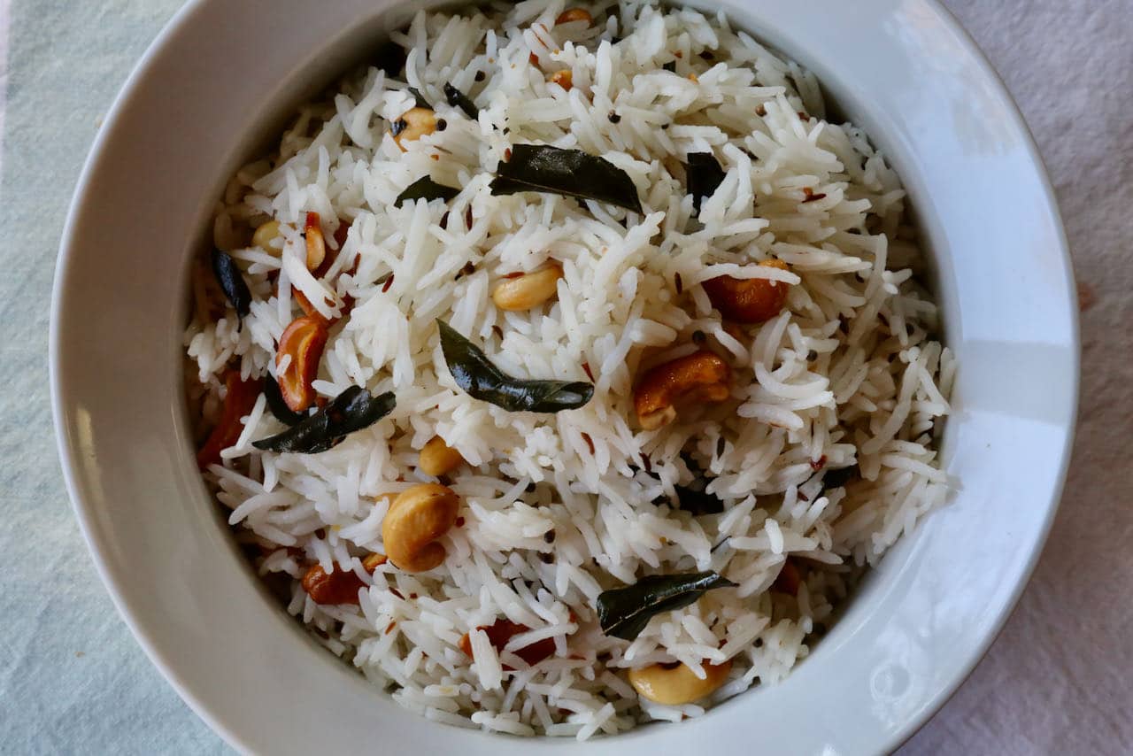 We like to serve Curry Leaf Rice in a large serving bowl to share family style at the table.