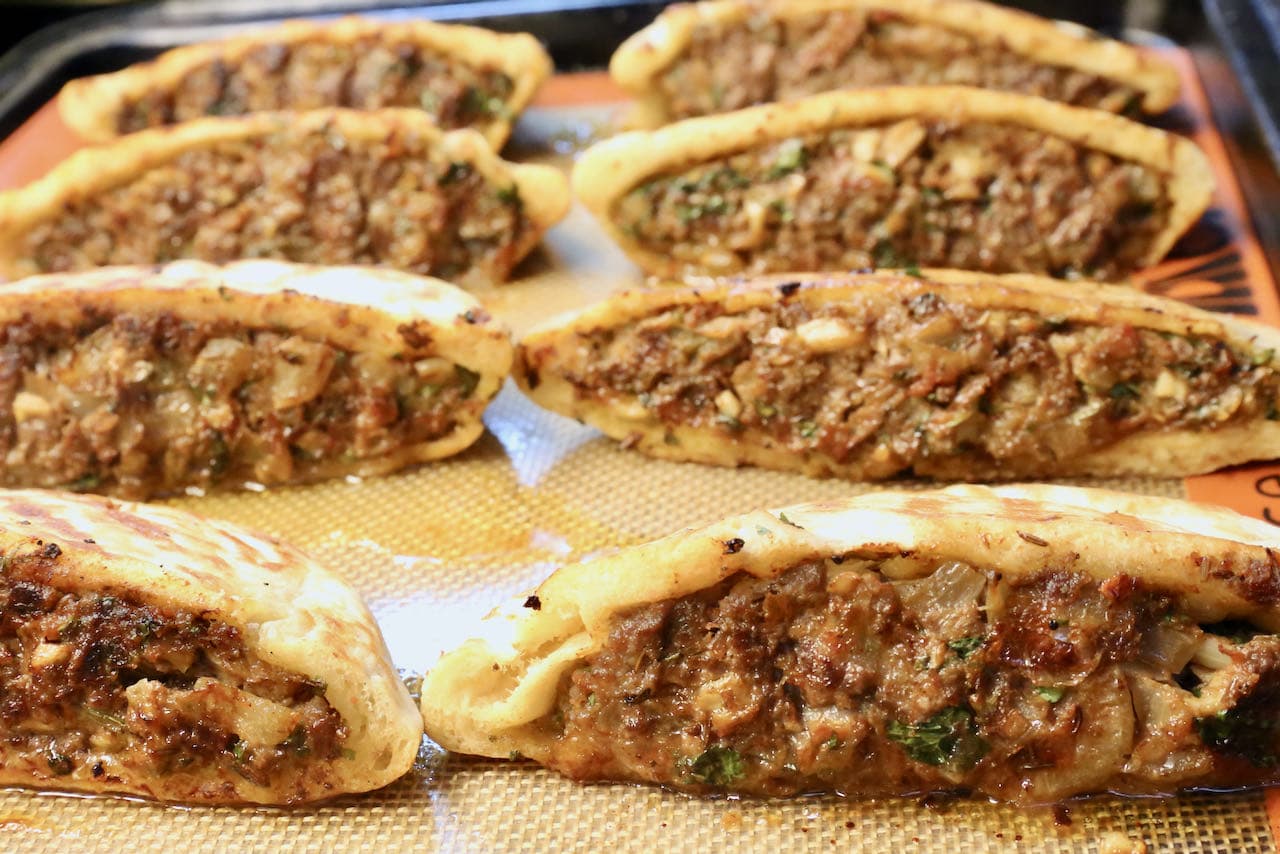 Arayes are finished cooking once the pita has a browned crispy exterior and meat is fully cooked.