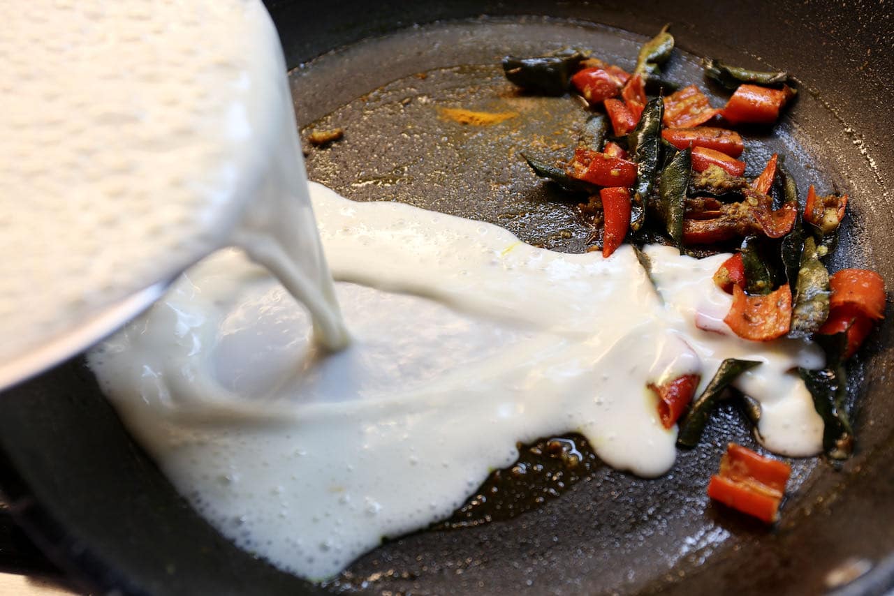 Add yogurt and chickpea flour mixture and stir until thickened. 