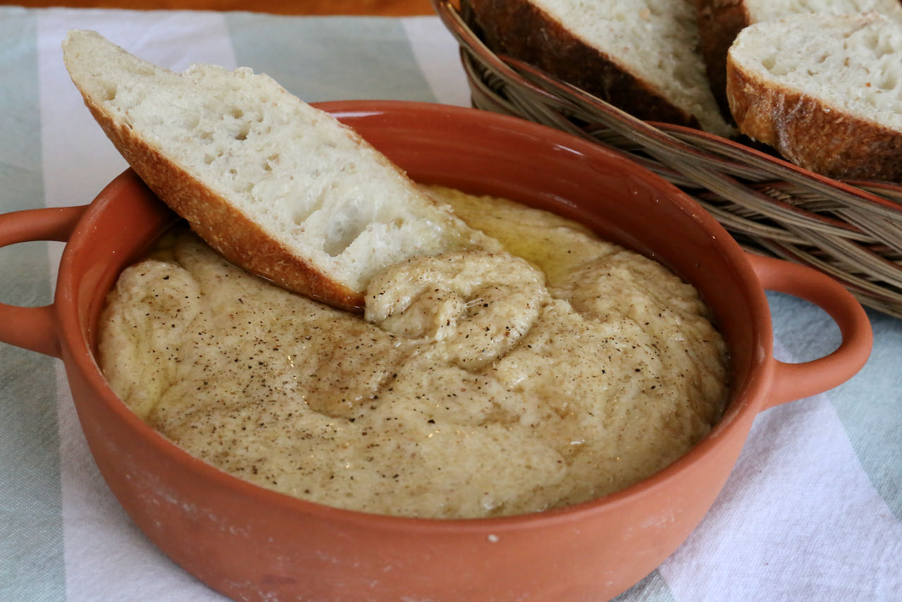 Immediately serve Kuymak Mihlama in a shallow dish when it's warm as it stiffens once it cools.