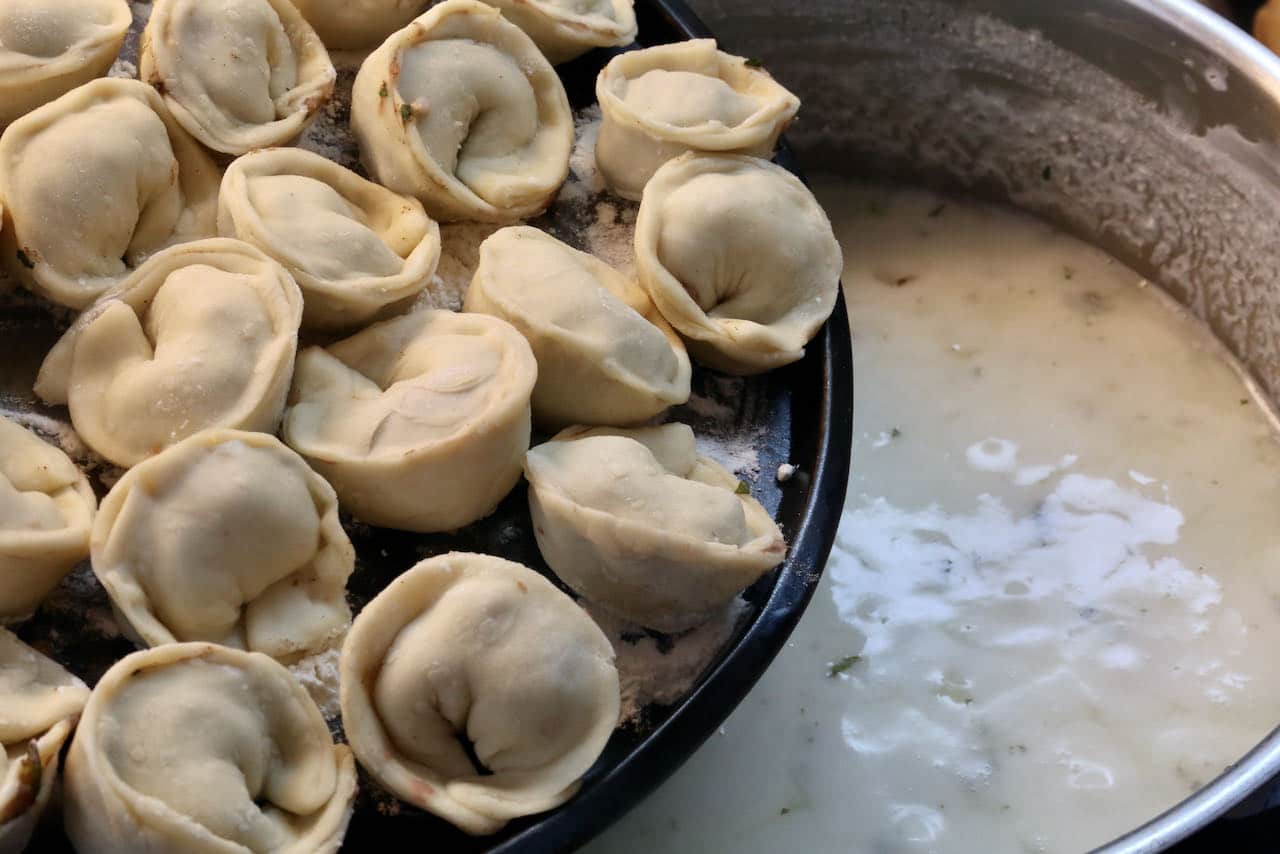 Cook Lamb Dumplings in a creamy and tangy yogurt sauce.