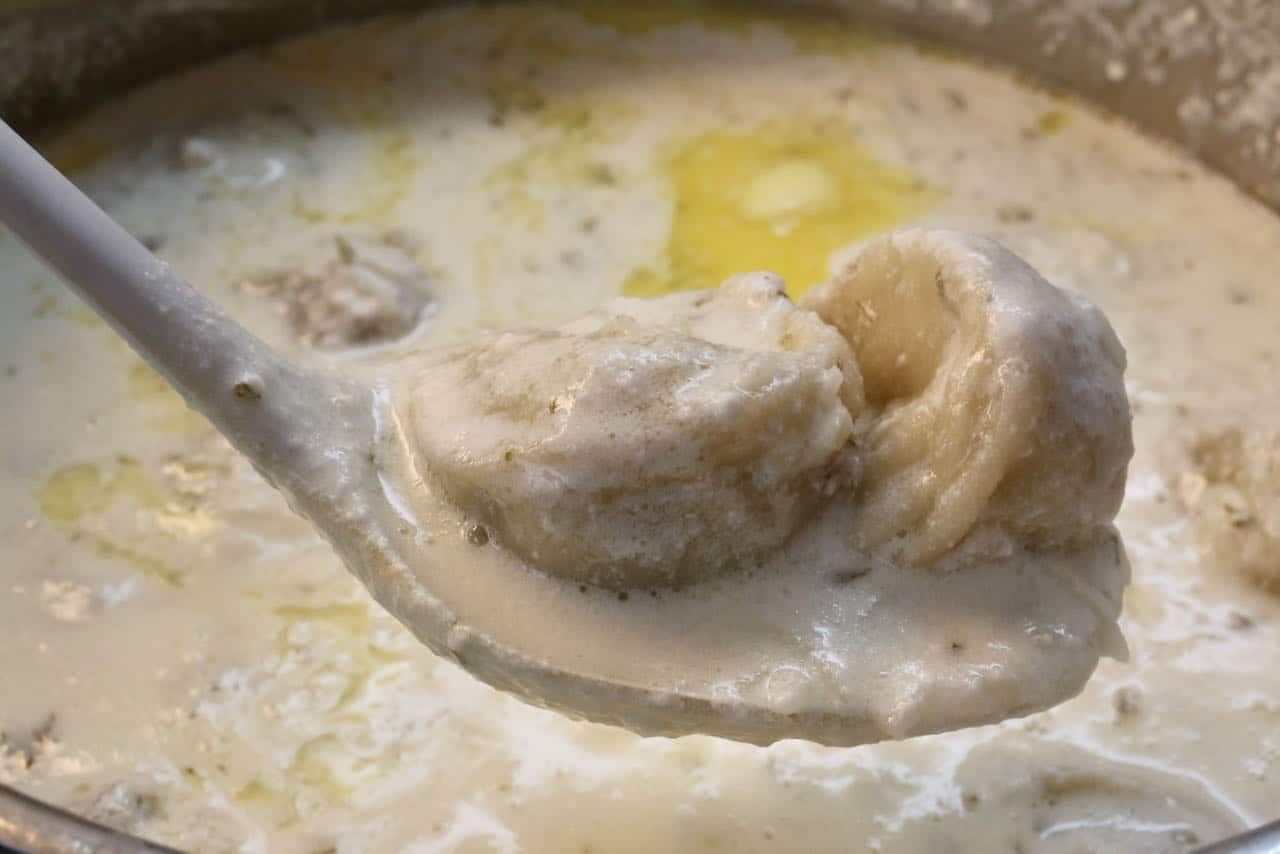 Ladle Shish Barak into bowls once dumplings are plump and chewy.