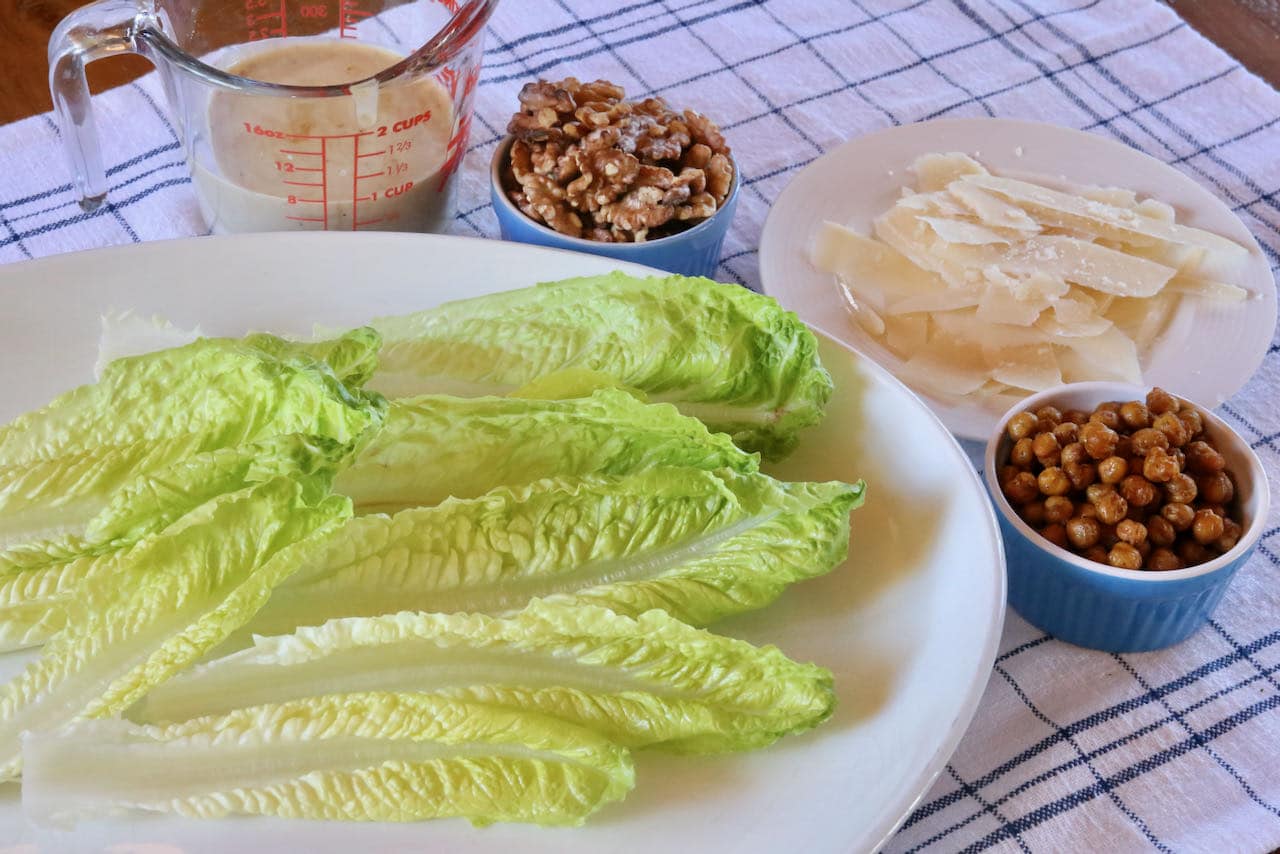 Romaine Salad with Tahini Caesar Dressing assembly.