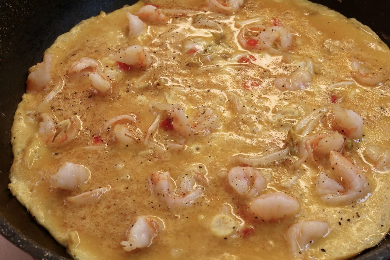 Prepare Prawn Omelette recipe in a large nonstick skillet.