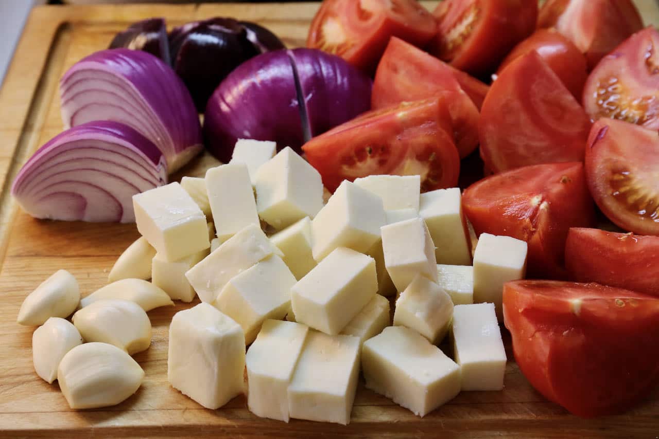 This easy vegetarian Indian Salad recipe features garlic, onion, tomato and paneer. 