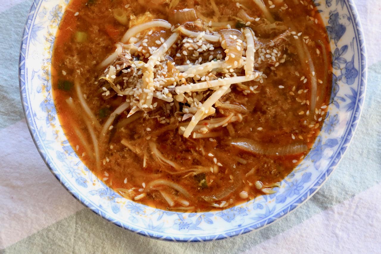 Serve Gukbap with Korean mandu dumplings, scallion pancakes or steamed rice.