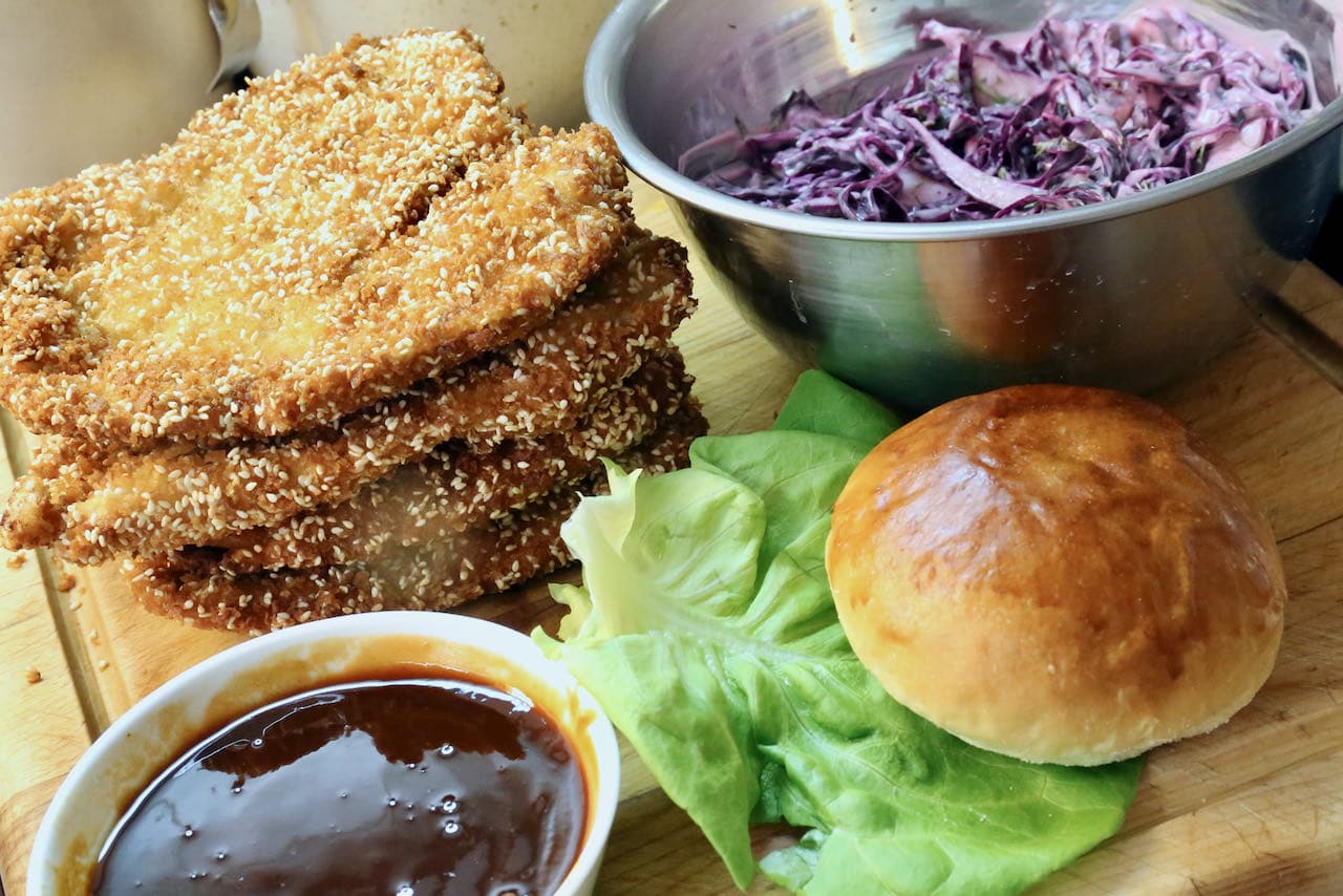 Chicken Schnitzel Sandwich assembly.