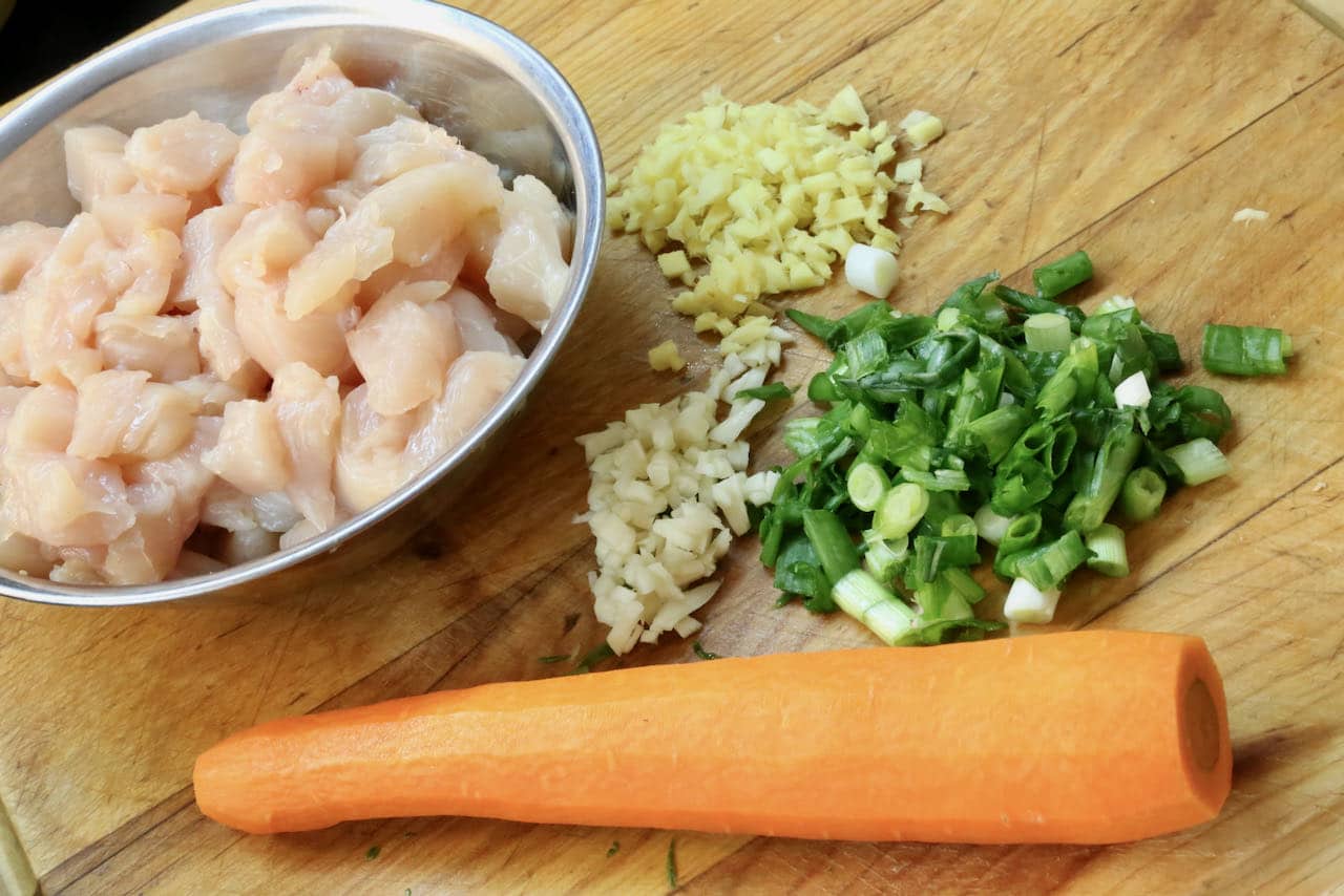 Yuk Sung filling features chopped chicken breasts, minced ginger, garlic, scallions and carrot.