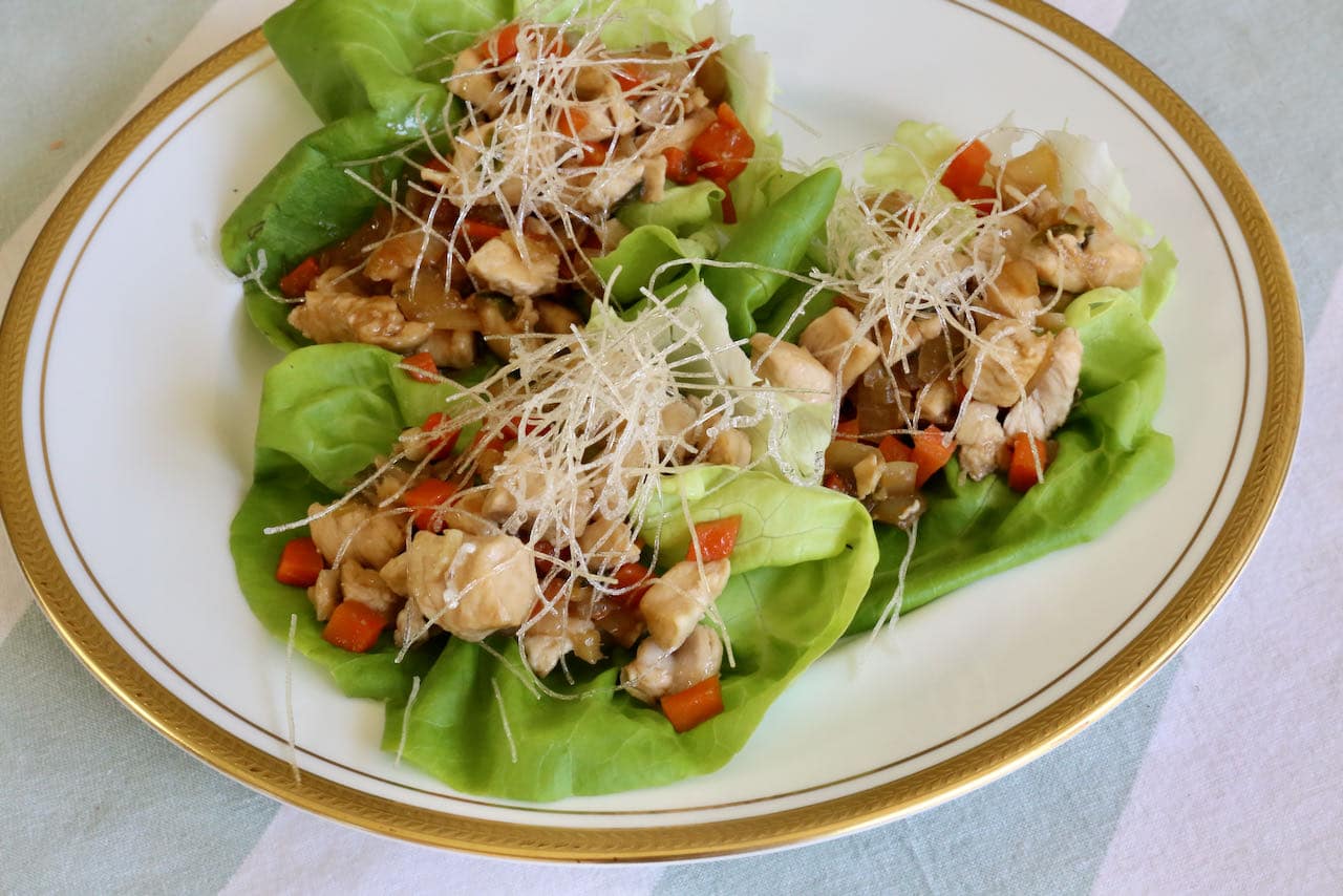 Garnish Chicken Yuk Sung with crispy fried rice noodles.