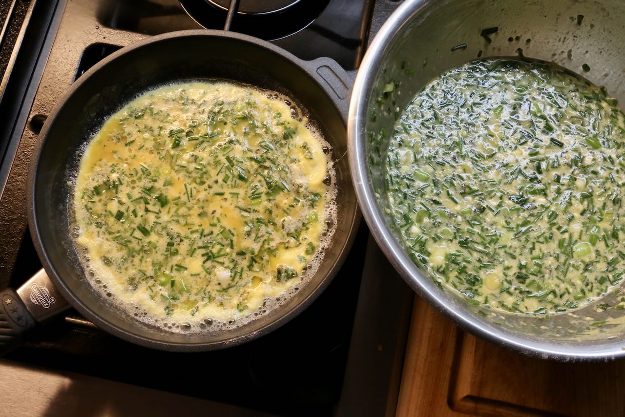 Cook homemade Ejjeh Lebanese Omelette in a large nonstick skillet.