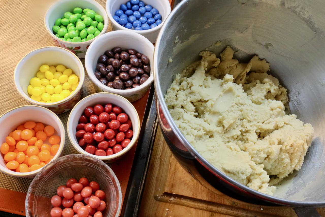 Organize Skittles by colour after preparing the sugar cookie dough.