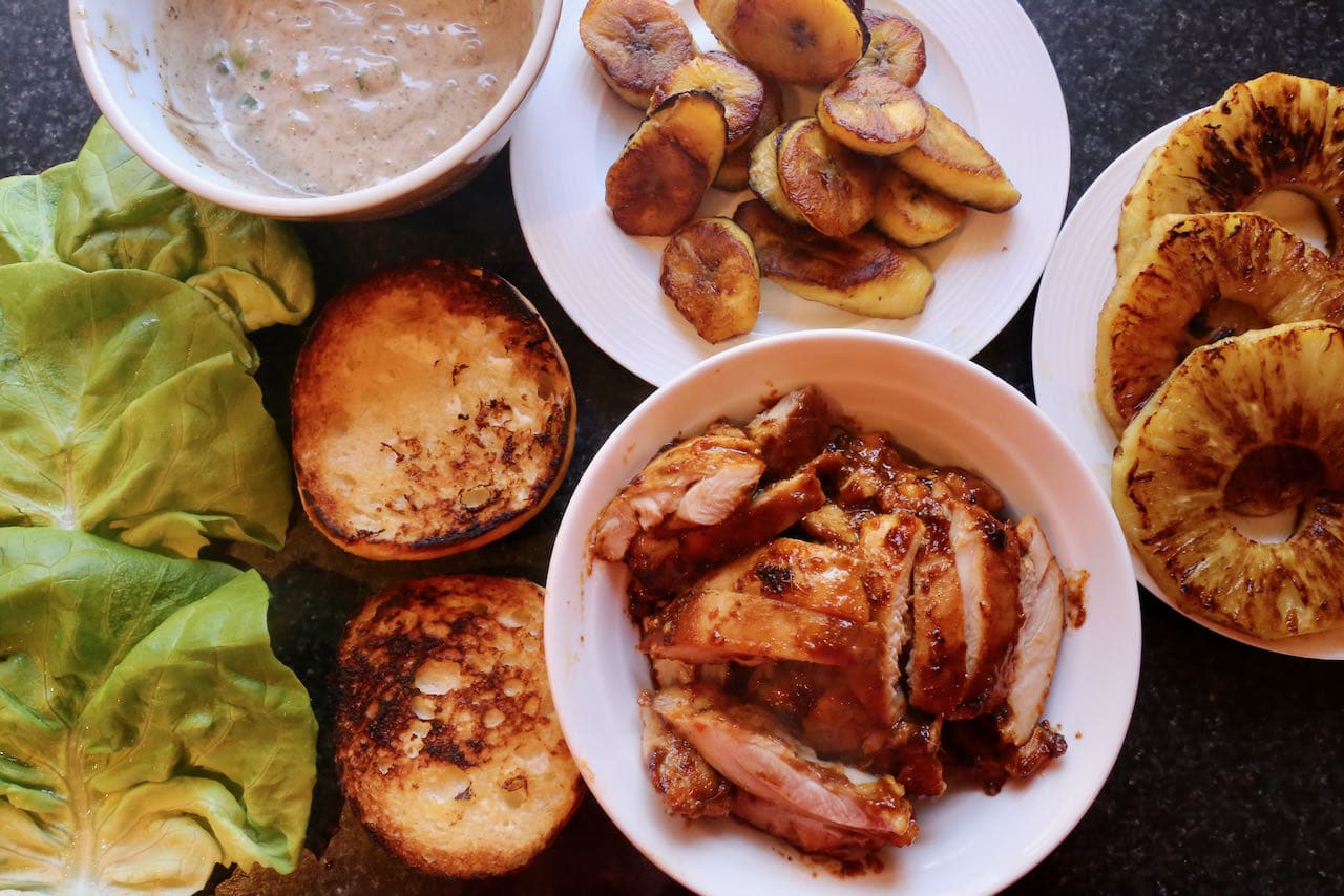 Jamaican Jerk Chicken Burger assembly. 