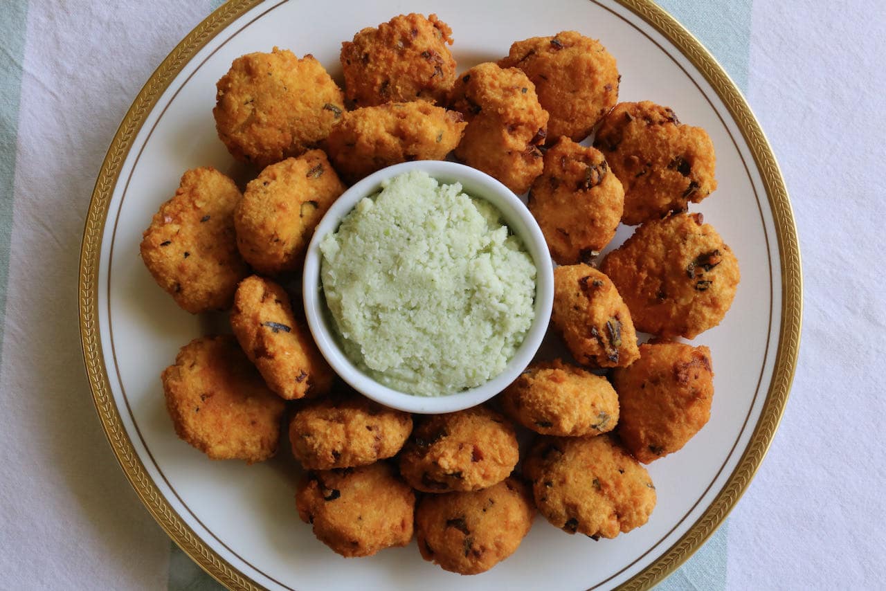 Serve Parippu Vada with spicy homemade coconut chutney. 