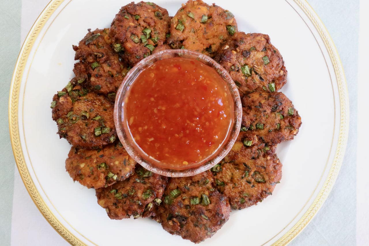 Serve this homemade Thai Fish Cake recipe with sweet chili sauce for dipping.