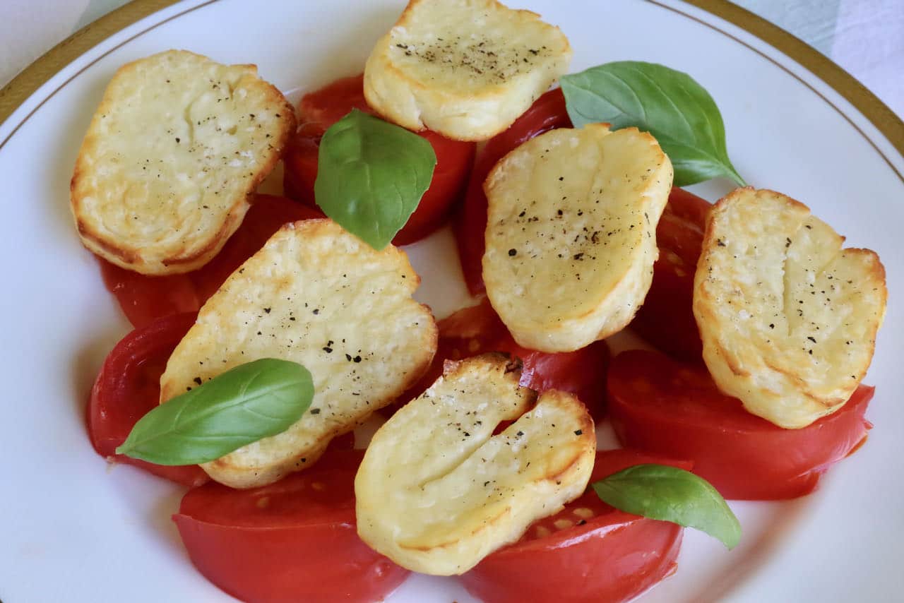 We love serving crispy Air Fried Halloumi with tomatoes and basil.
