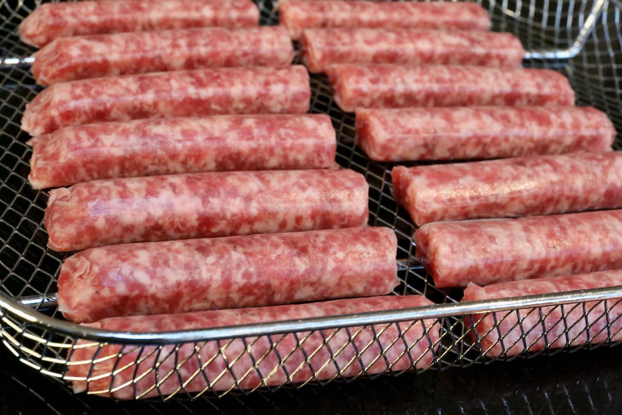 Our Breakfast Sausage in Air Fryer recipe is prepared in an air fryer basket. 