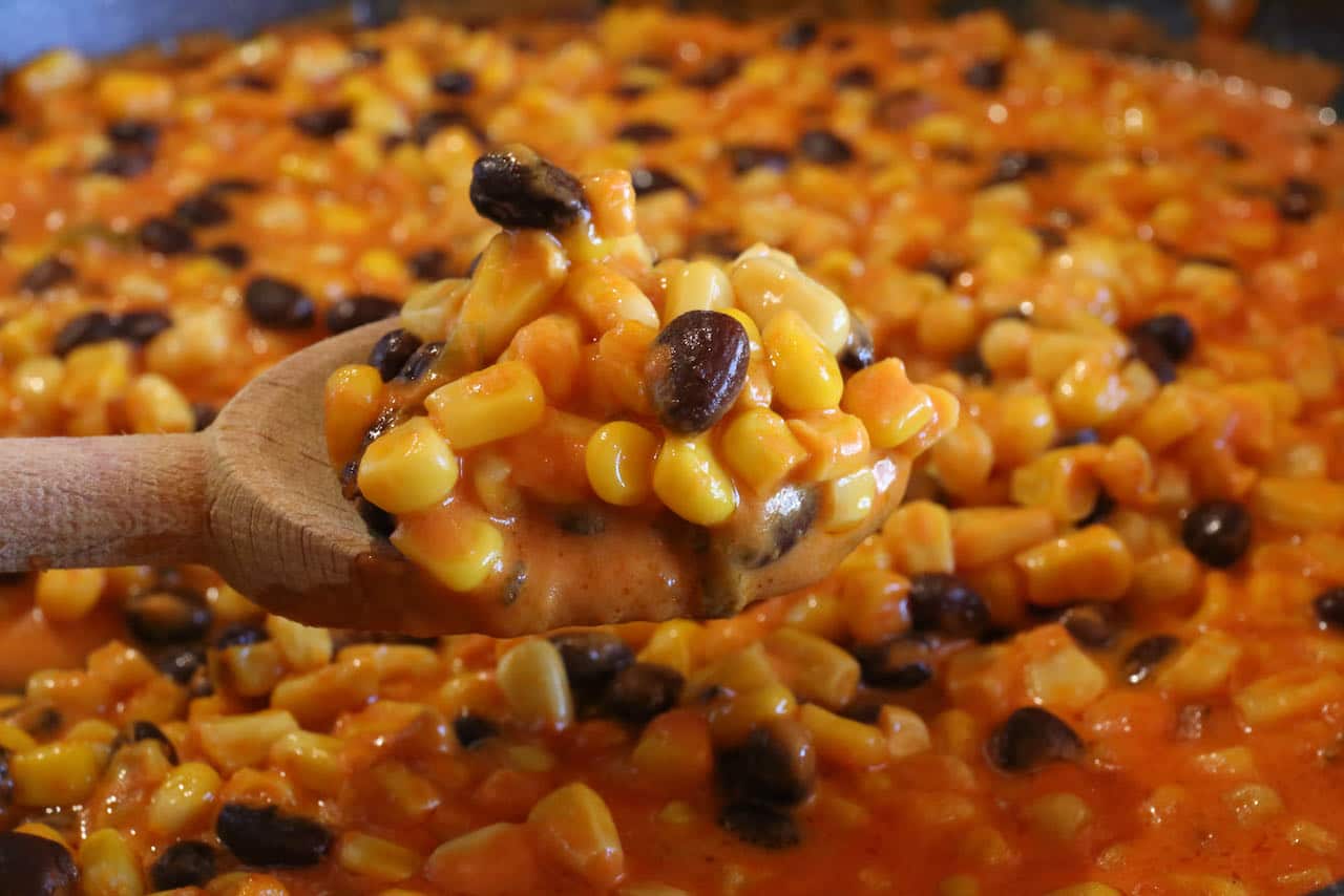 We love making this vegetarian curry recipe when we have canned corn and black beans hiding in the cupboards.