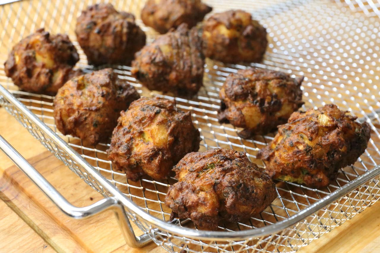 Air Fryer Pakoras are finished cooking when the exterior is crunchy and crispy and interior is warm and tender.