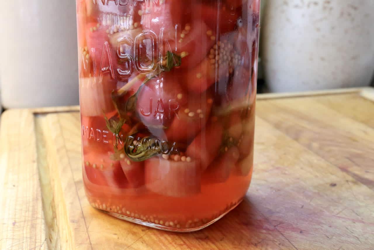 Let Pickled Rhubarb rest in a cool, dark place for a week before opening.