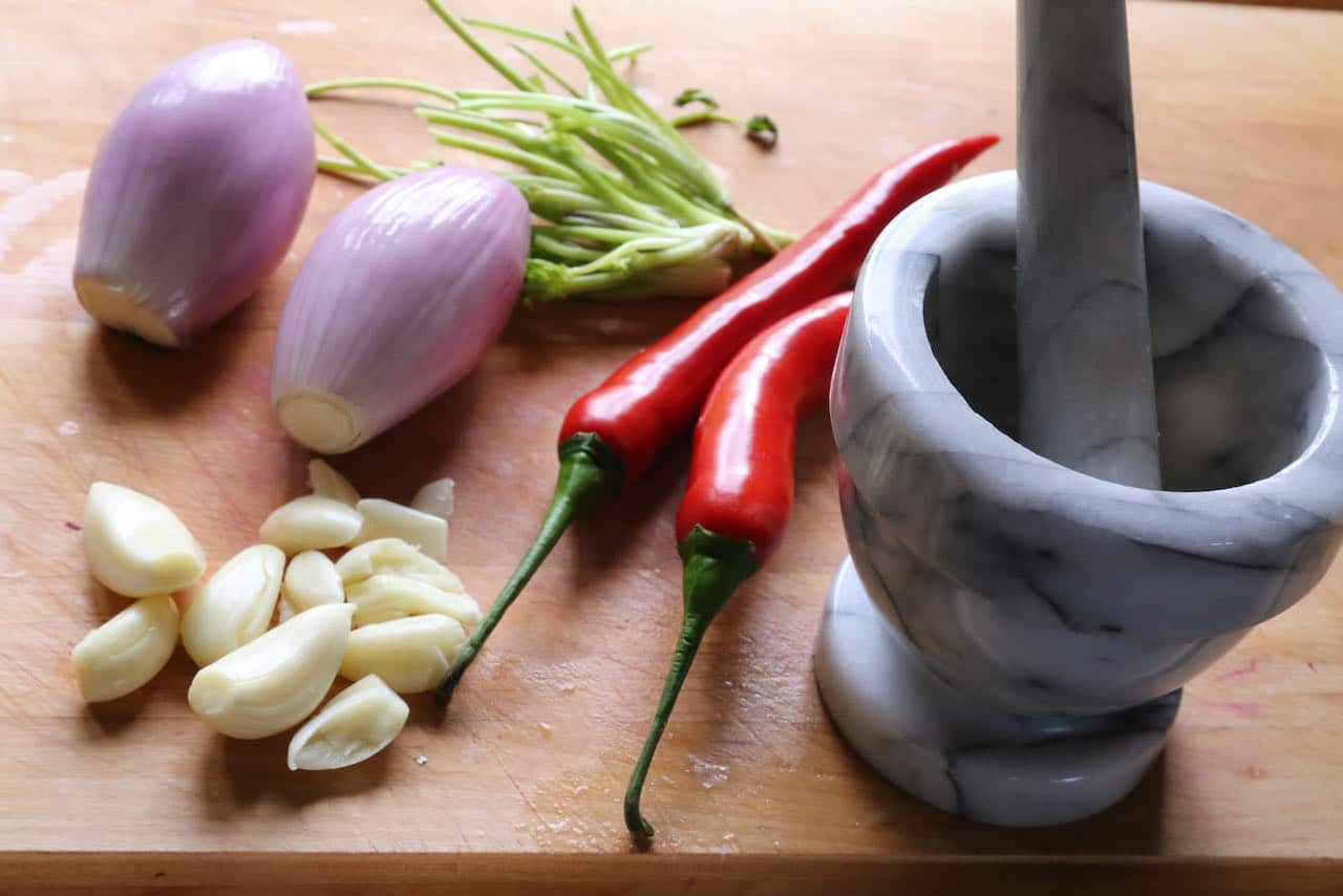 Authentic Tamarind Prawn Curry is flavoured with garlic, shallots, chili and cilantro root.