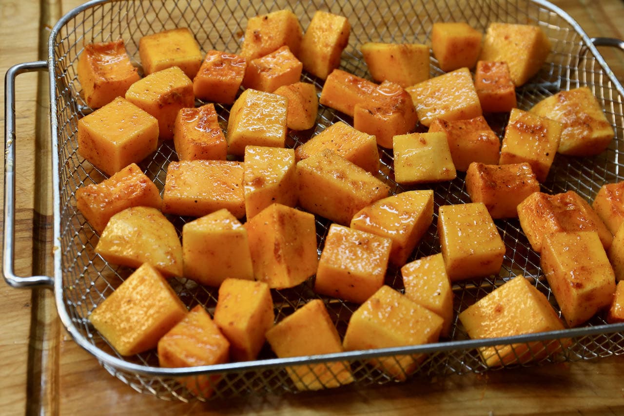 Scatter squash in air fryer basket. 