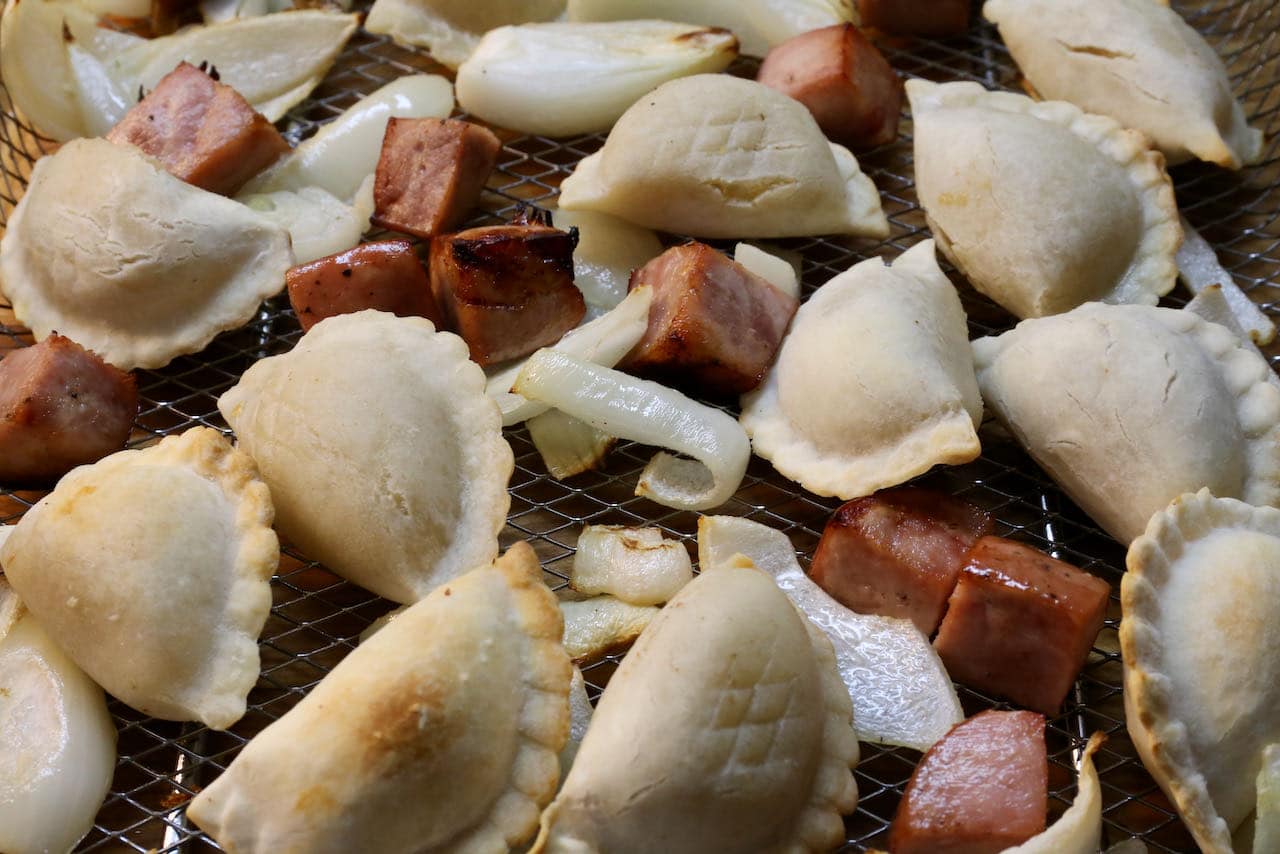 Air Fryer Pierogies are best paired with fried onions and crispy kielbasa.