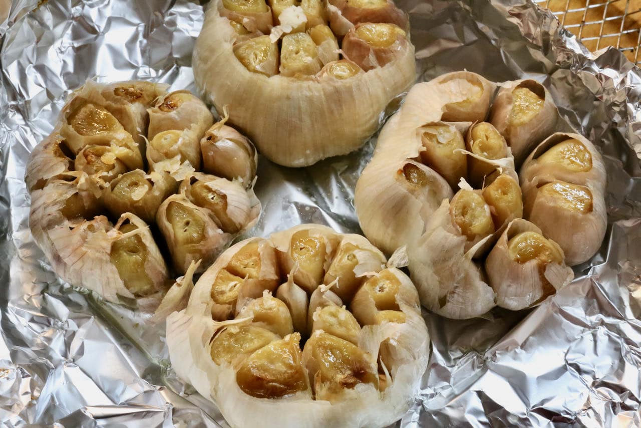 Air Fryer Roasted Garlic is finished cooking once the cloves have browned and are soft.