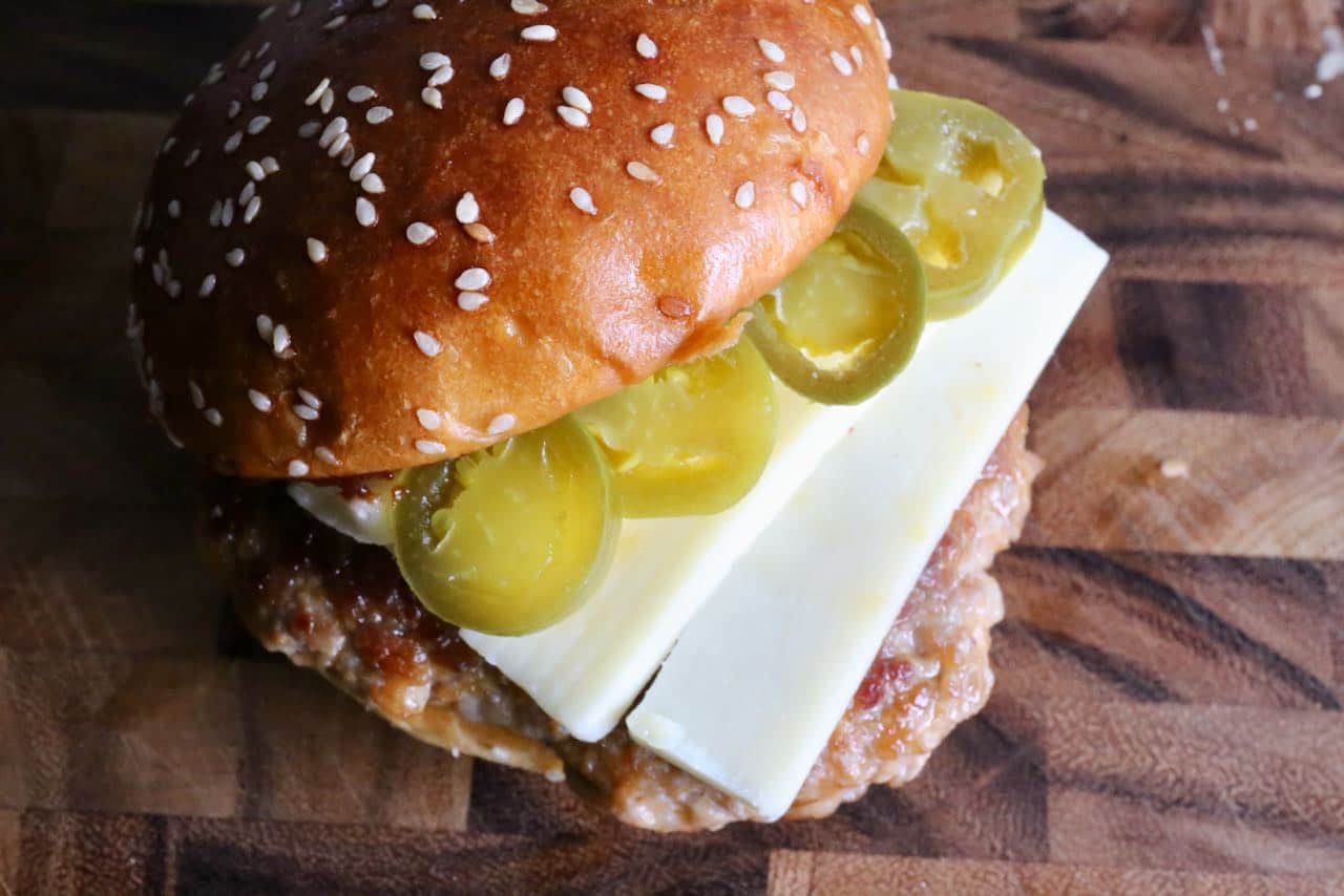 We love serving this Spicy Pork Burger with chips, fries and carrot sticks. 