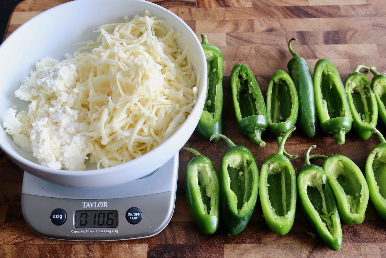Prepare the jalapeno pepper boats and mix the creamy cheese filling.