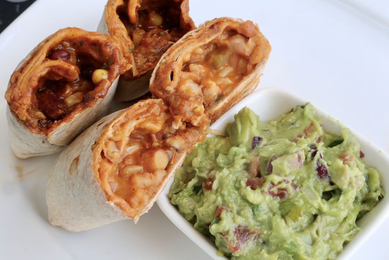 A cooked Air Fryer Frozen Burrito should have a crunchy exterior and steaming hot interior.