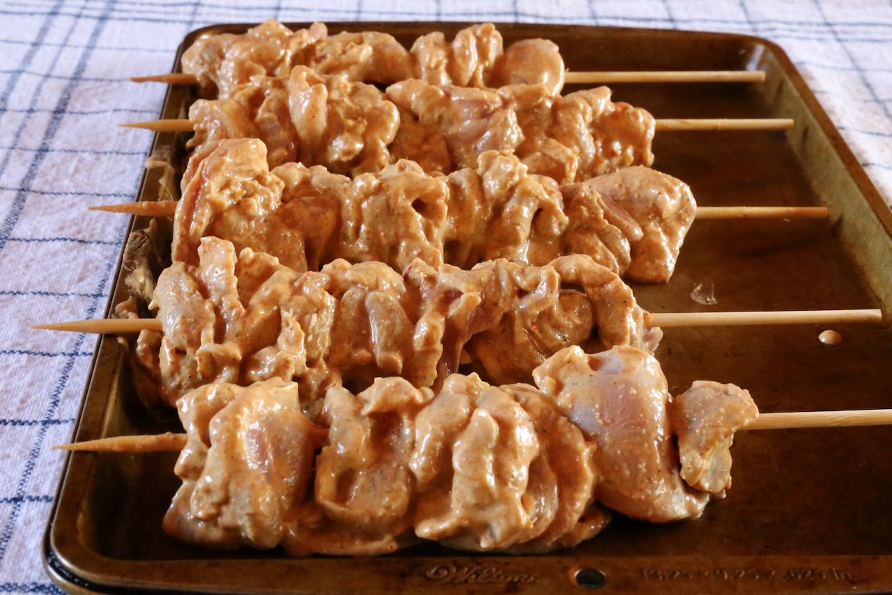 Cook Chicken Boti Kabab skewers on a hot grill, barbecue or broiled in an oven.