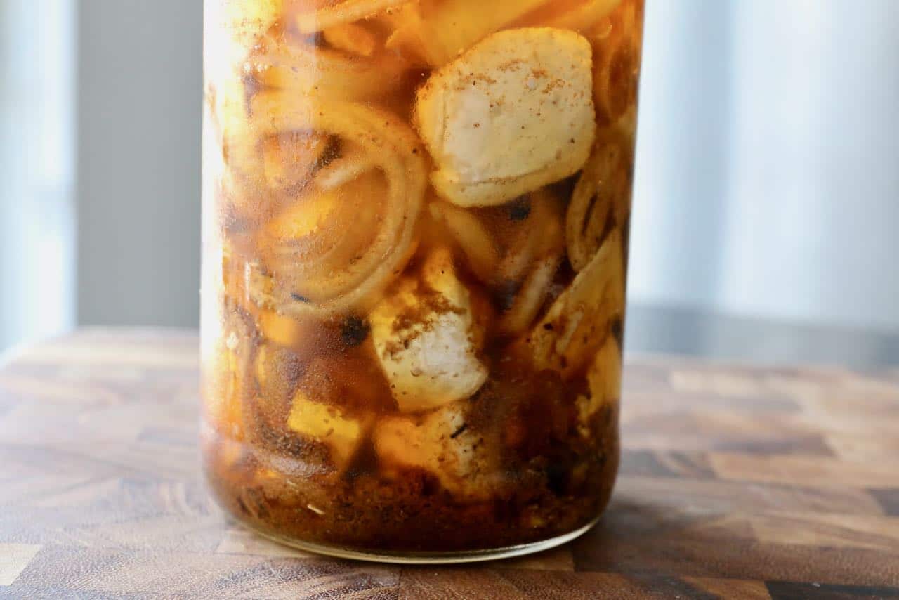 Nakladany Hermelin is a Czech marinated cheese recipe flavoured with spices, garlic and onion.