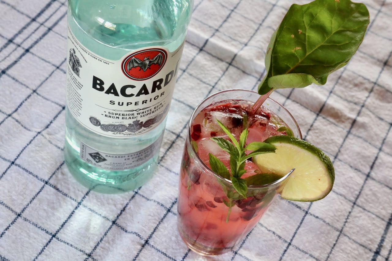Serve a Rhubarb Mojito in a Collins glass with a sprig of mint, stalk of rhubarb and slice of lime. 